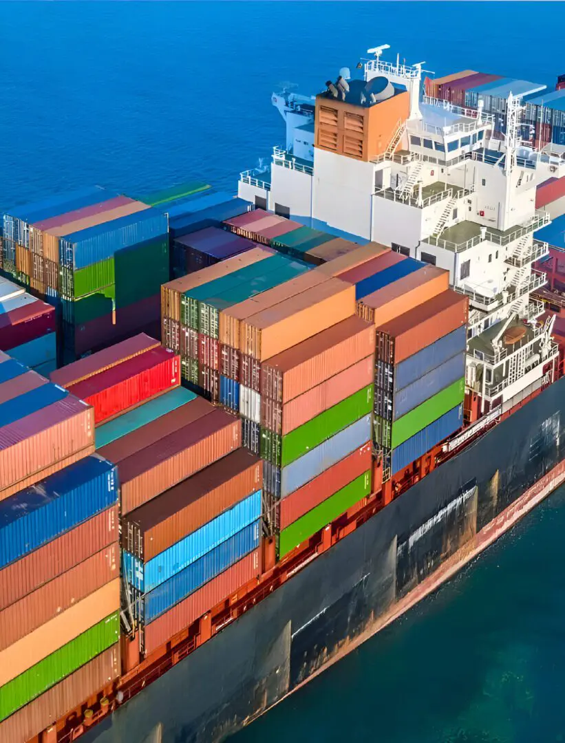 A large cargo ship with many containers on it.