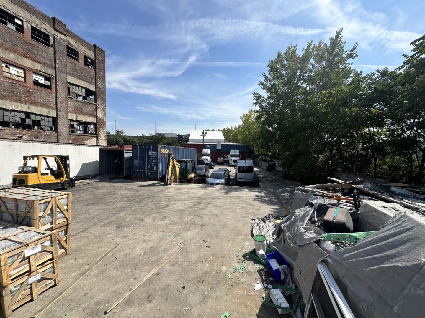 A parking lot with many cars parked in it.